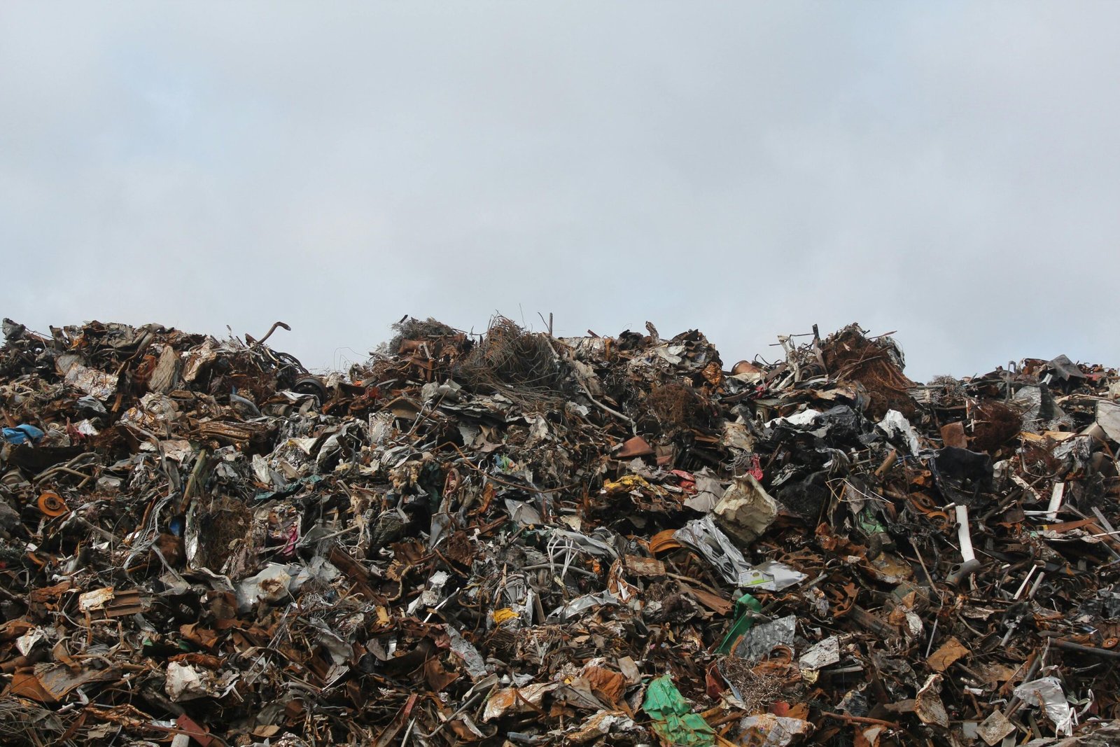 a pile of metal pipes and other metal objects