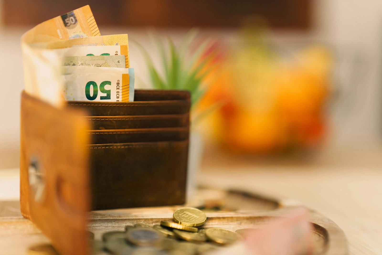 a wallet with money and coins in it