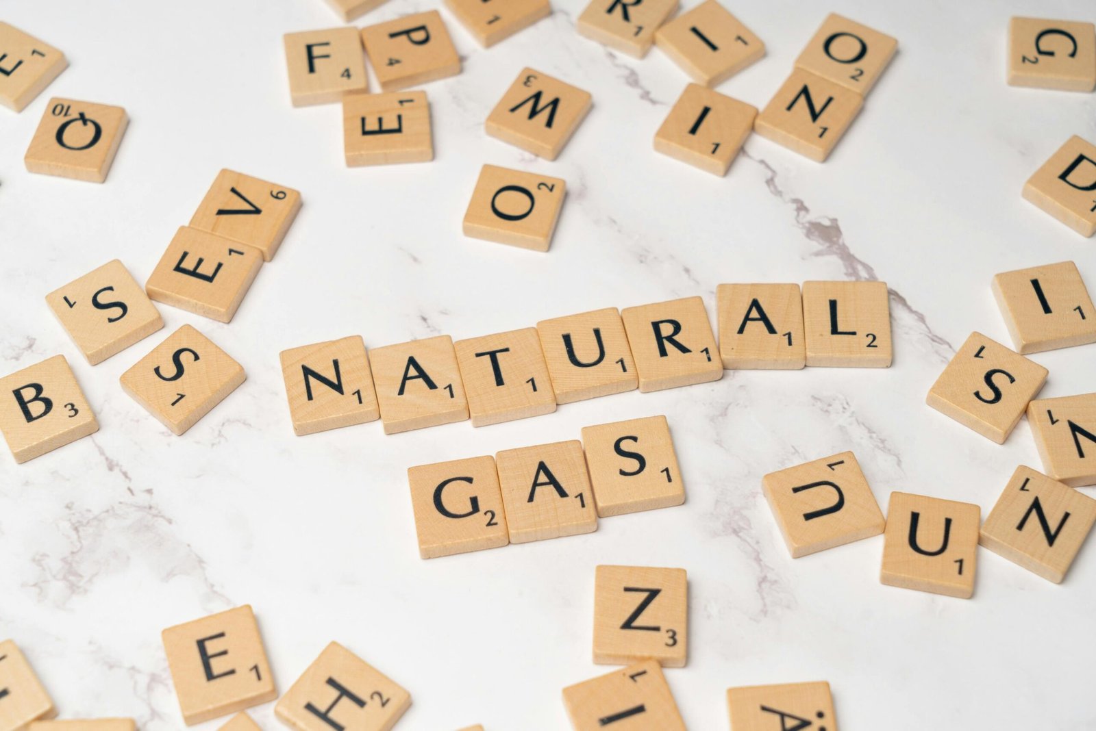 a bunch of scrabbles that say natural gas