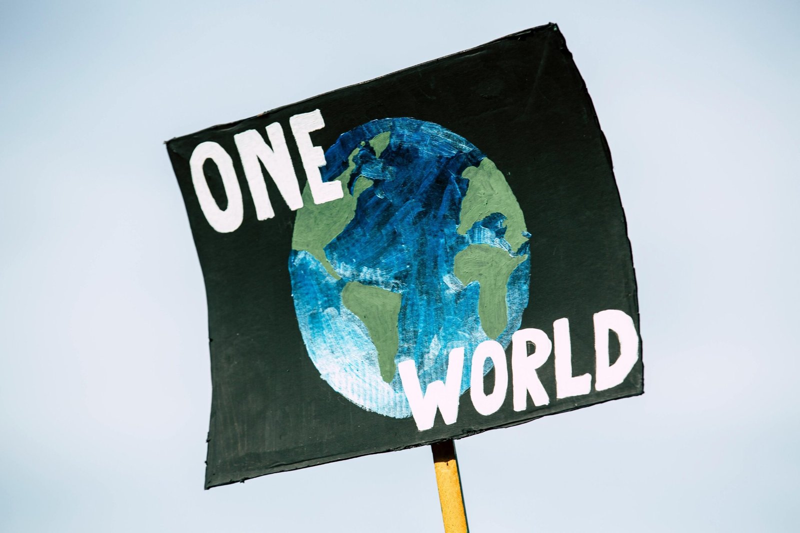 a one world sign