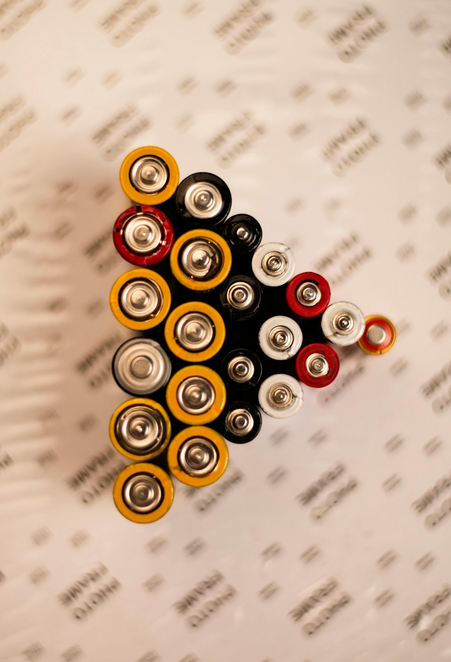 a pile of batteries on a table
