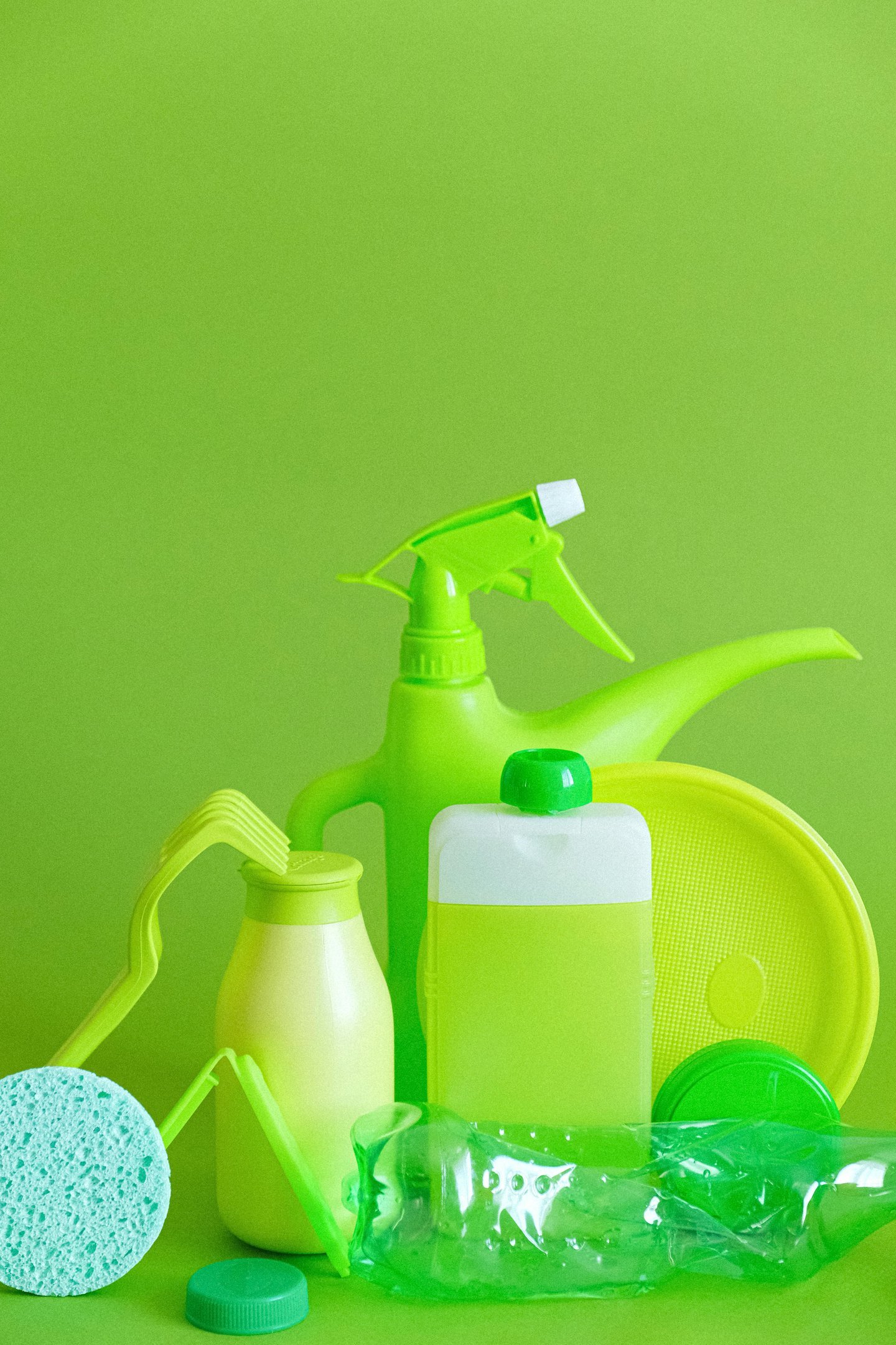 a variety of cleaning products including a bottle of cleaner